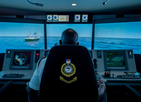 Royal Bahamas Defence Force (RBDF) Squadron Commanding Officer and Sea Training Officer William Sturrup inside a ship training simulator on the RBDF base in Nassau, Bahamas. The RBDF is on the front lines in the fight against illegal, unreported and unregulated (IUU) fishing in The Bahamas.